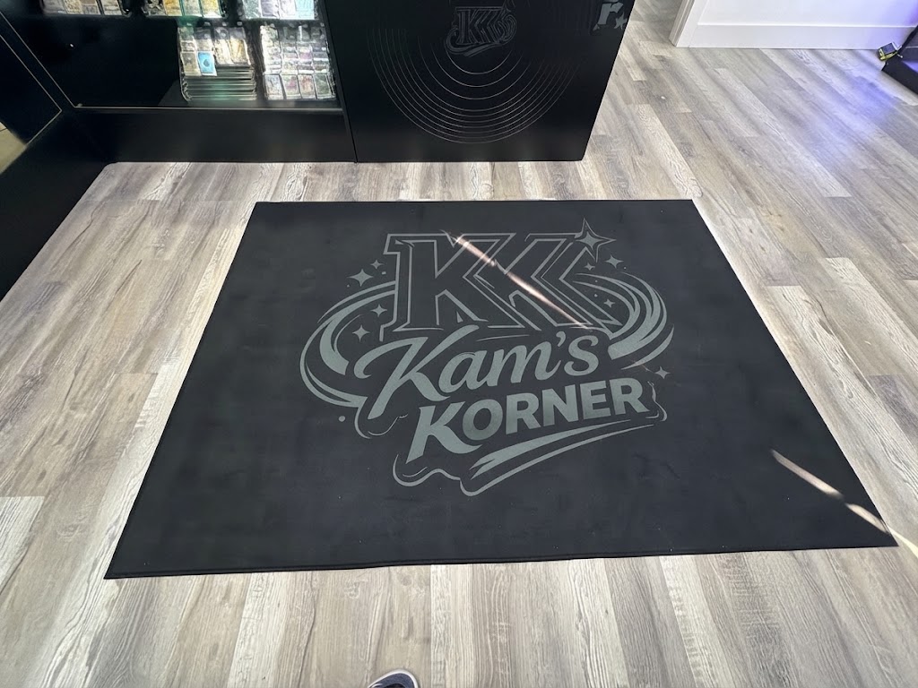 Kam's Korner floor mat at the shop entrance